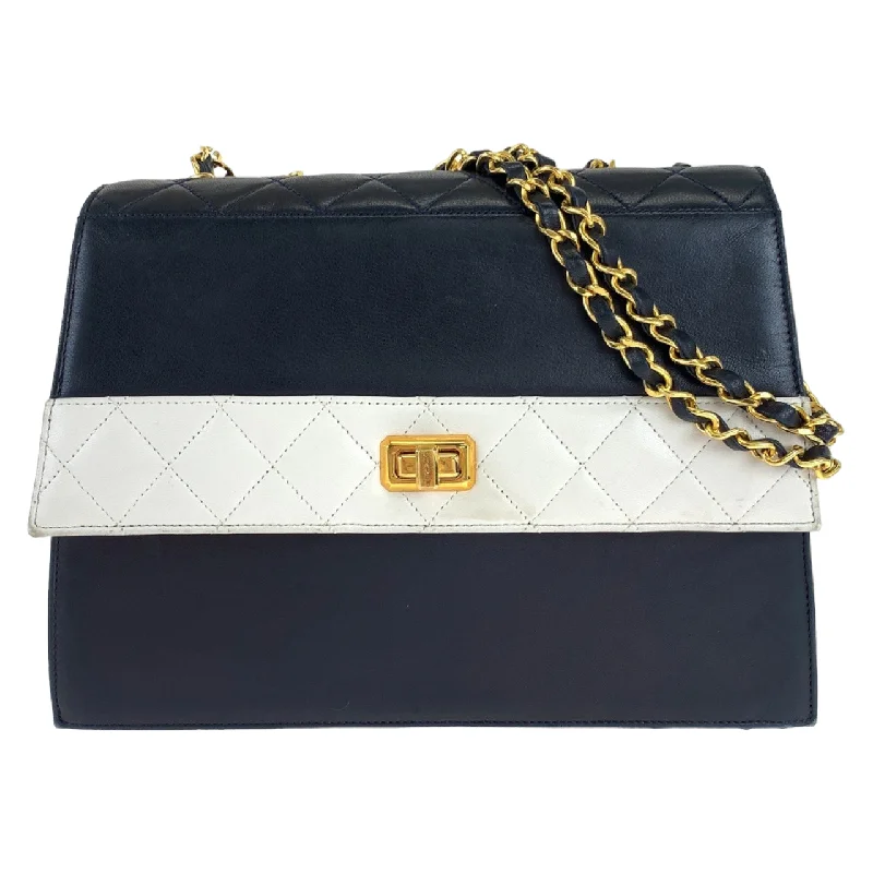 Ladies shoulder bag in swirl pattern-Chanel Lambskin Trapezoid Turn Lock Shoulder Bag