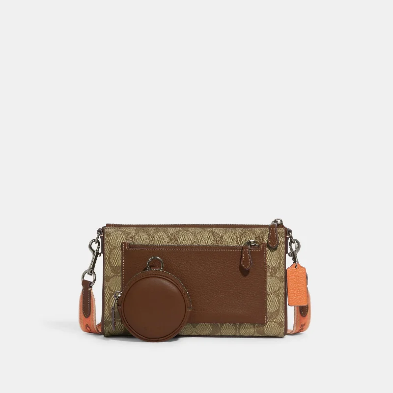 Ladies crossbody bag with animal print-Coach Outlet Holden Crossbody In Colorblock Signature Canvas